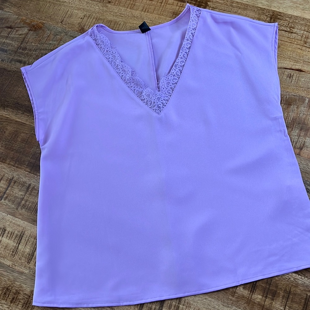 Woman’s purple top.  Size Sm